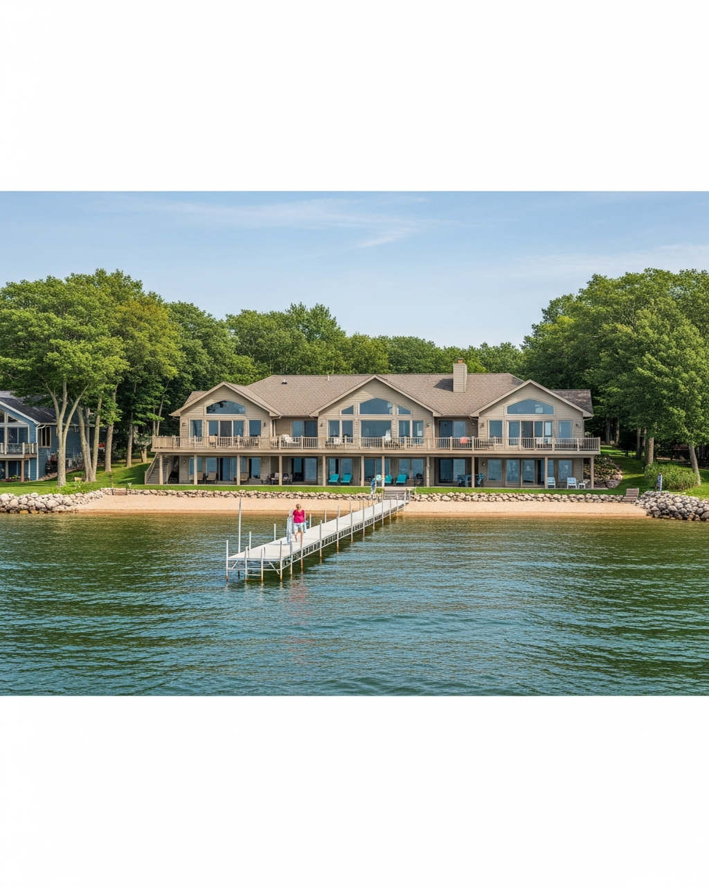 Lakefront lodge on Grand Traverse Bay with private dock and beach
