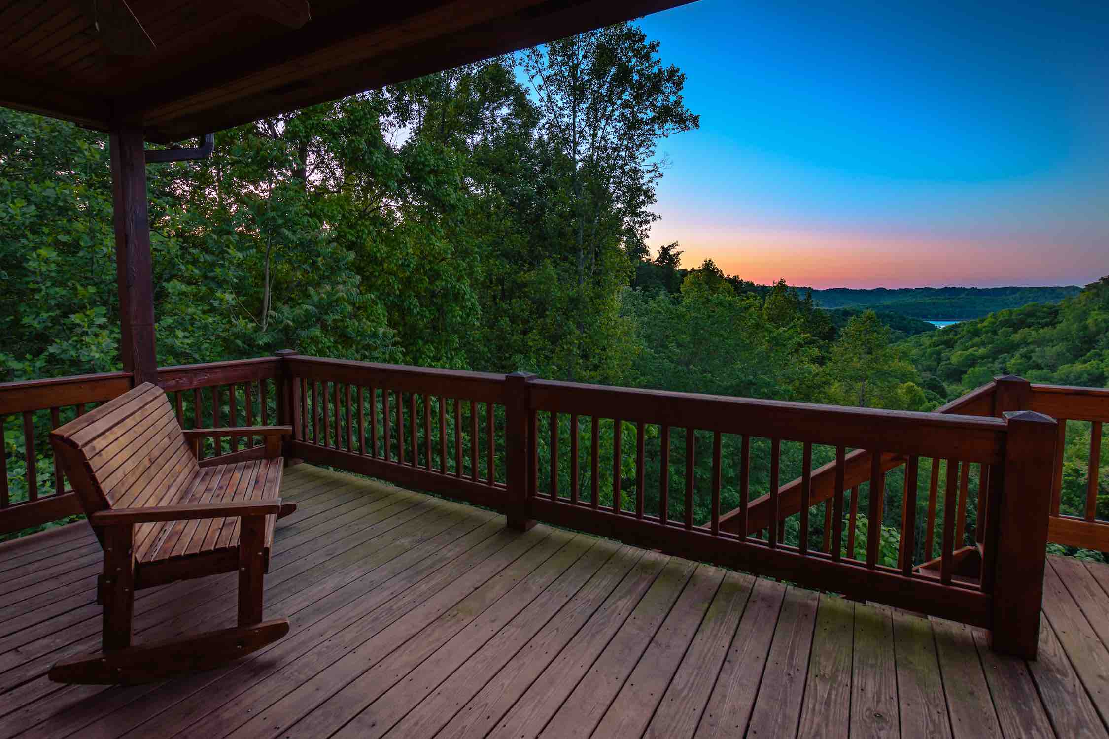 Luxury multi-level cabin in the Smoky Mountains with mountain views and wraparound deck